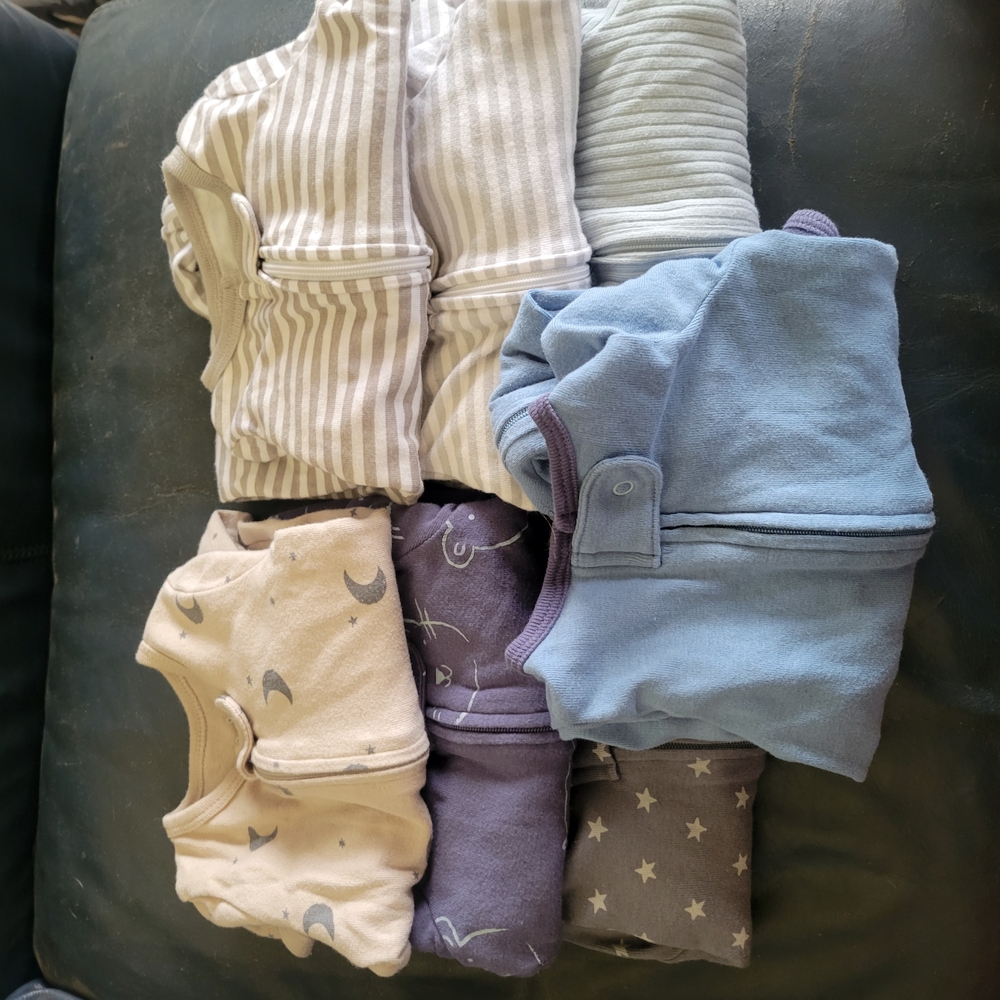 Assorted Baby Sleepers in Neutral and Blue Tones